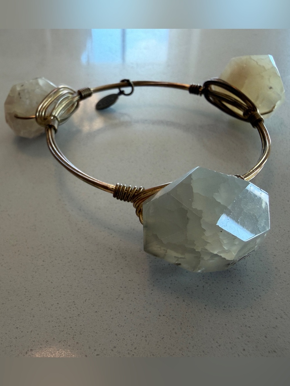 Bourbon and Bowties Gold-Tone Bangle with Pale Green Gem Accents